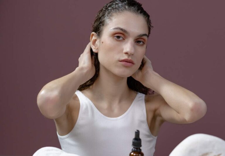 putting oil in hair before straightening